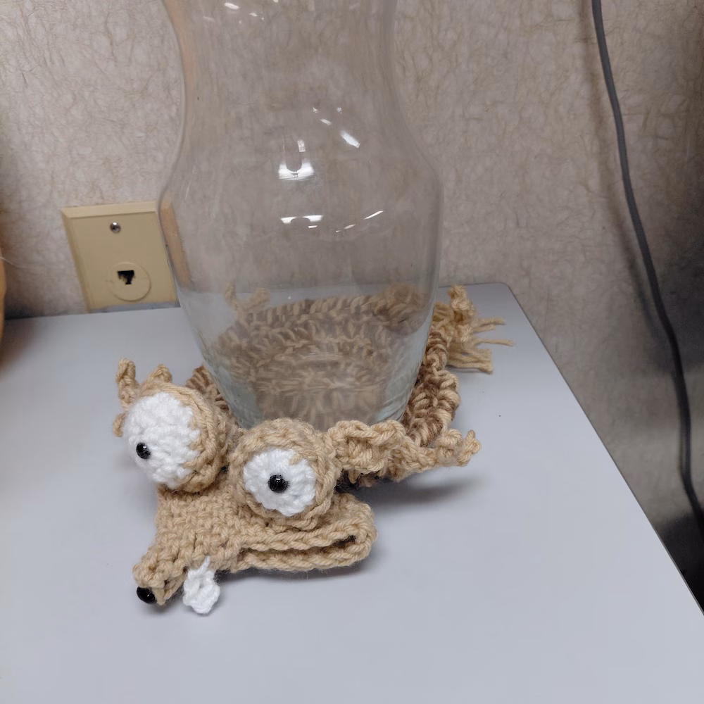 Crocheted animal mug hugger coaster