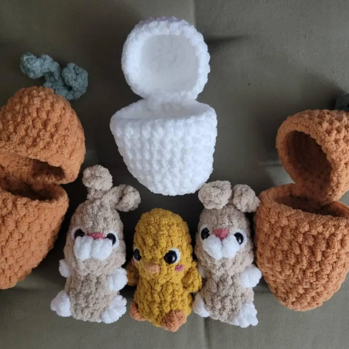 Mini crocheted bear peeking out of its egg