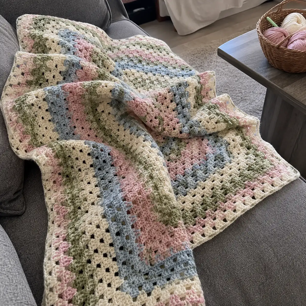 Crocheted baby blanket with a matching hat